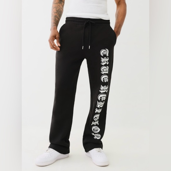 True Religion Other - FLOCKED LOGO STACKED SWEAT
PANT - Black | True Religion